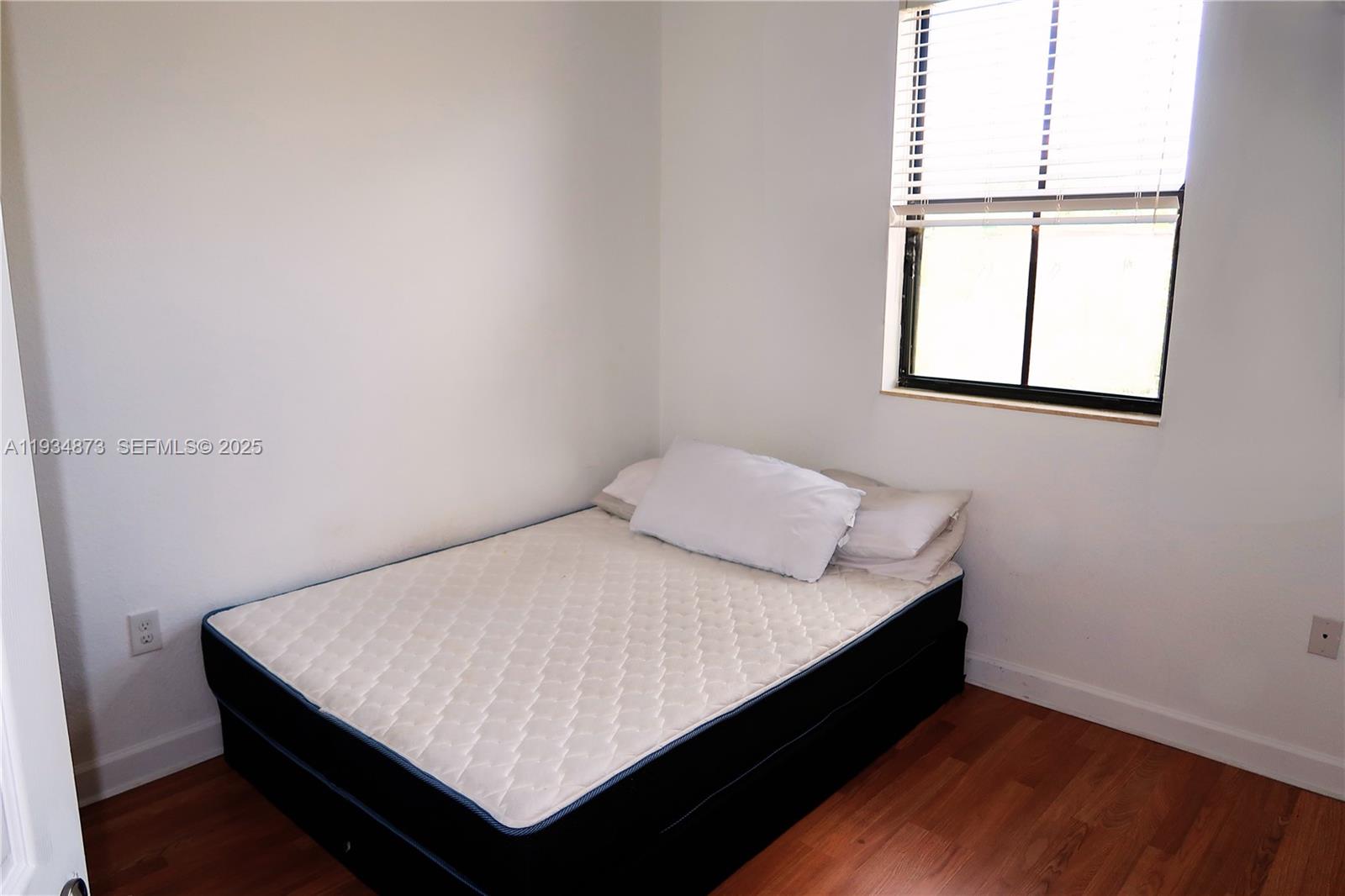 11334 Southwest 236th Street, Unit 11334 Homestead, FL 33032 - Photo 18 of 25 a close up of a bed in a room