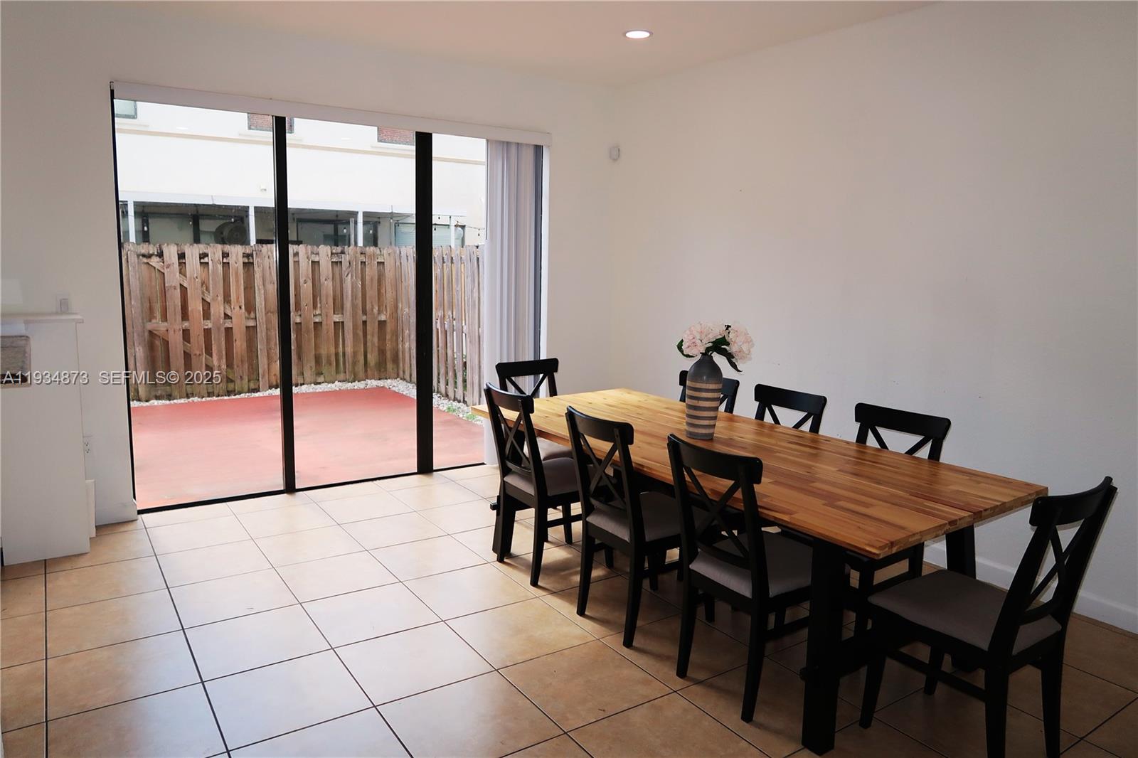 11334 Southwest 236th Street, Unit 11334 Homestead, FL 33032 - Photo 5 of 25 a view of a dining room with furniture