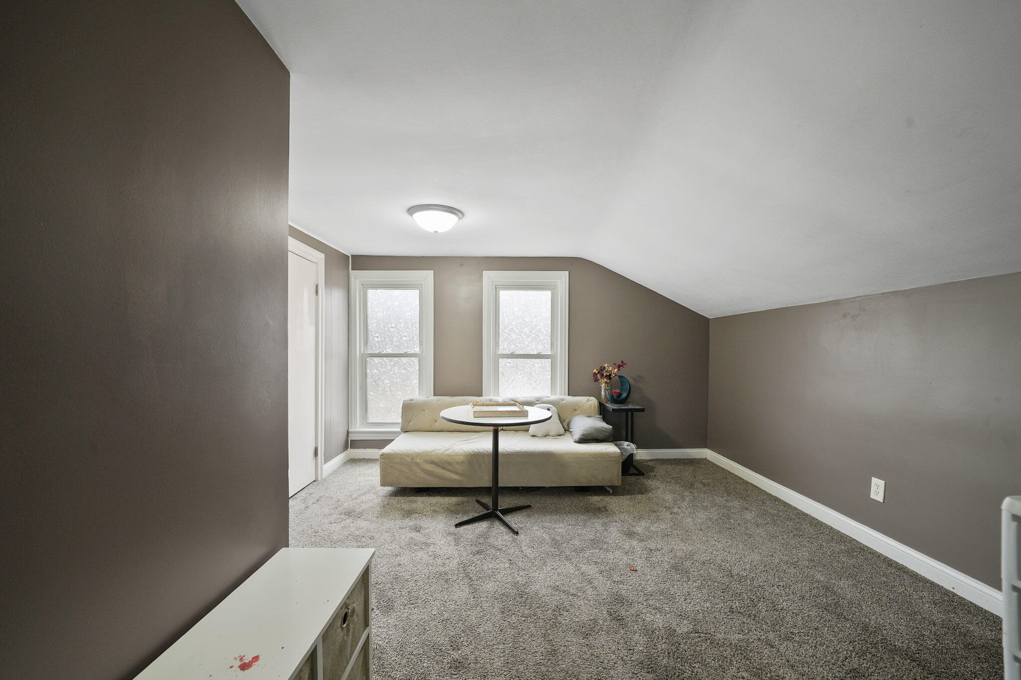 345 Castle Street Lowell, IN 46356 - Photo 12 of 27 a living room with furniture and window