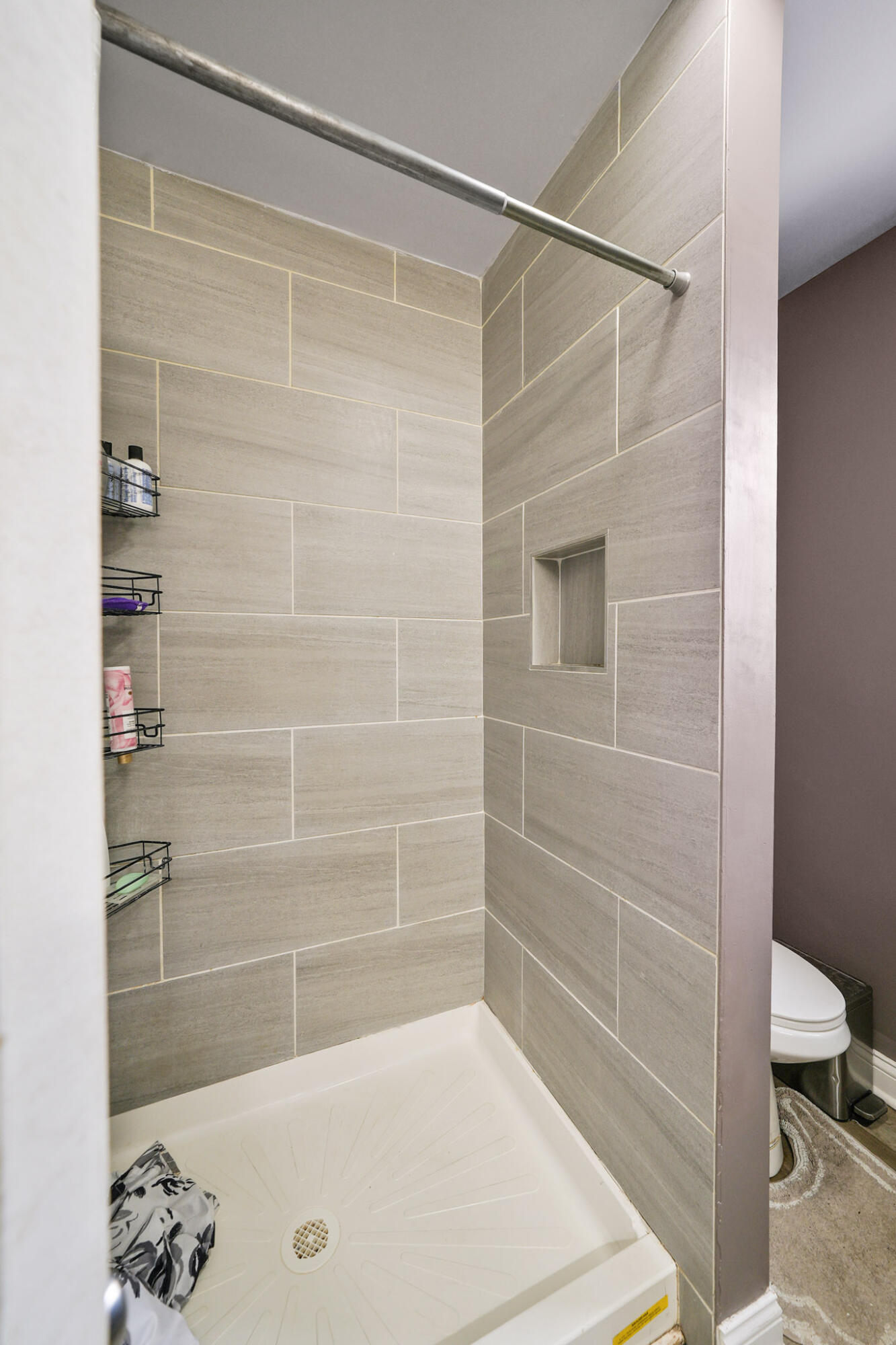 345 Castle Street Lowell, IN 46356 - Photo 16 of 27 a bathroom with a shower and a toilet