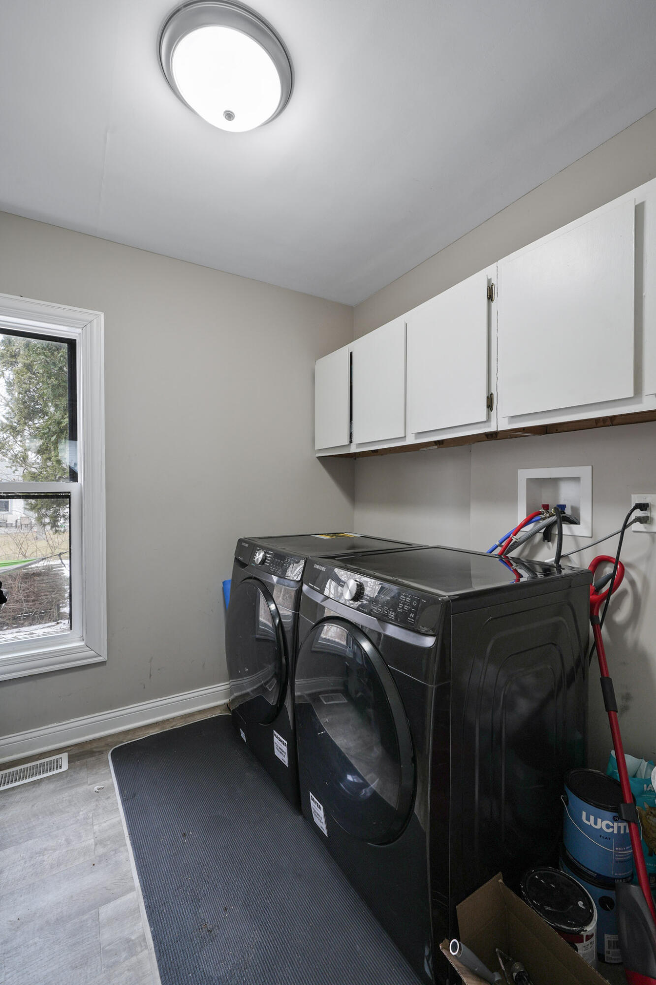 345 Castle Street Lowell, IN 46356 - Photo 18 of 27 a utility room with sink dryer and washer
