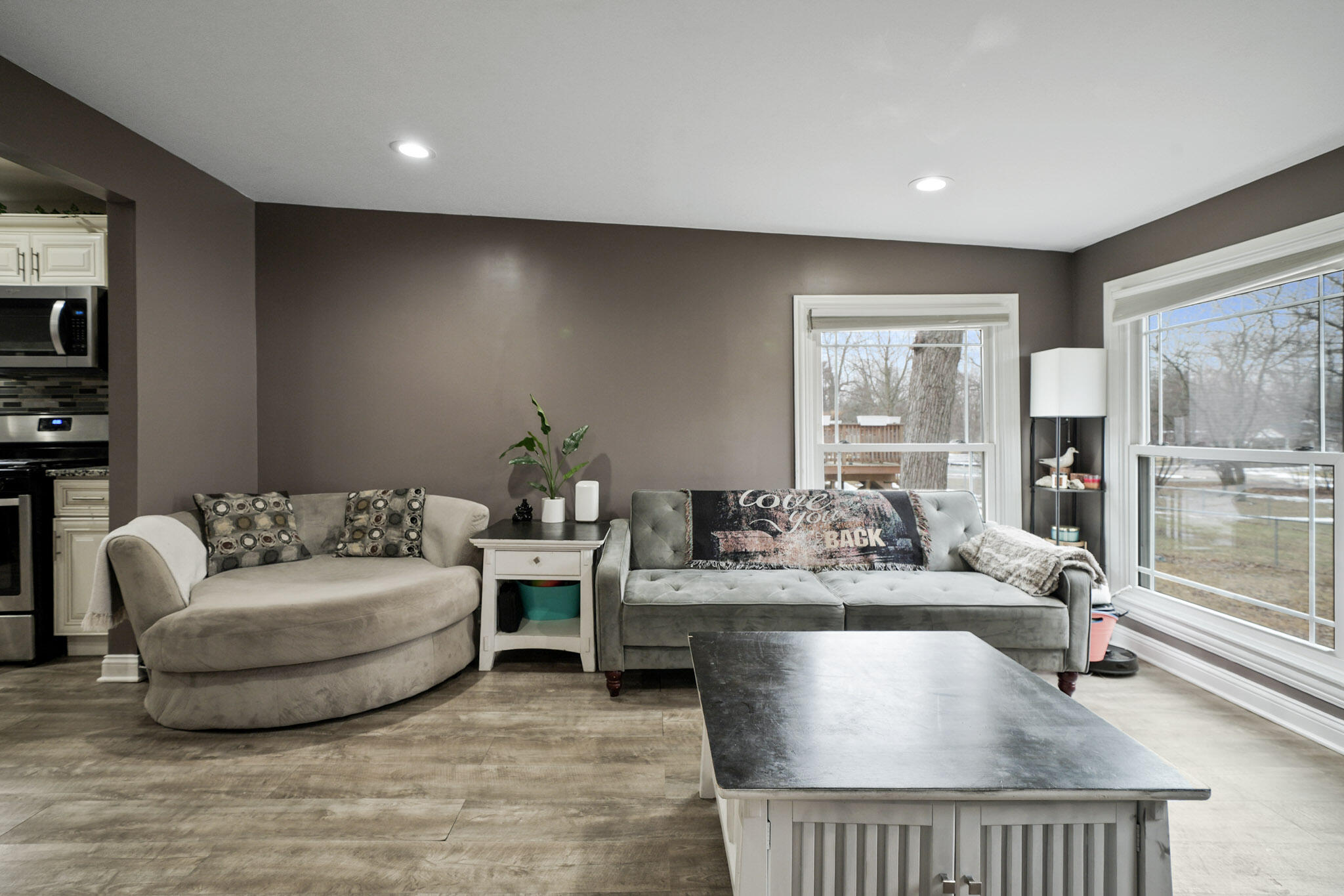 345 Castle Street Lowell, IN 46356 - Photo 22 of 27 a living room with furniture and a table