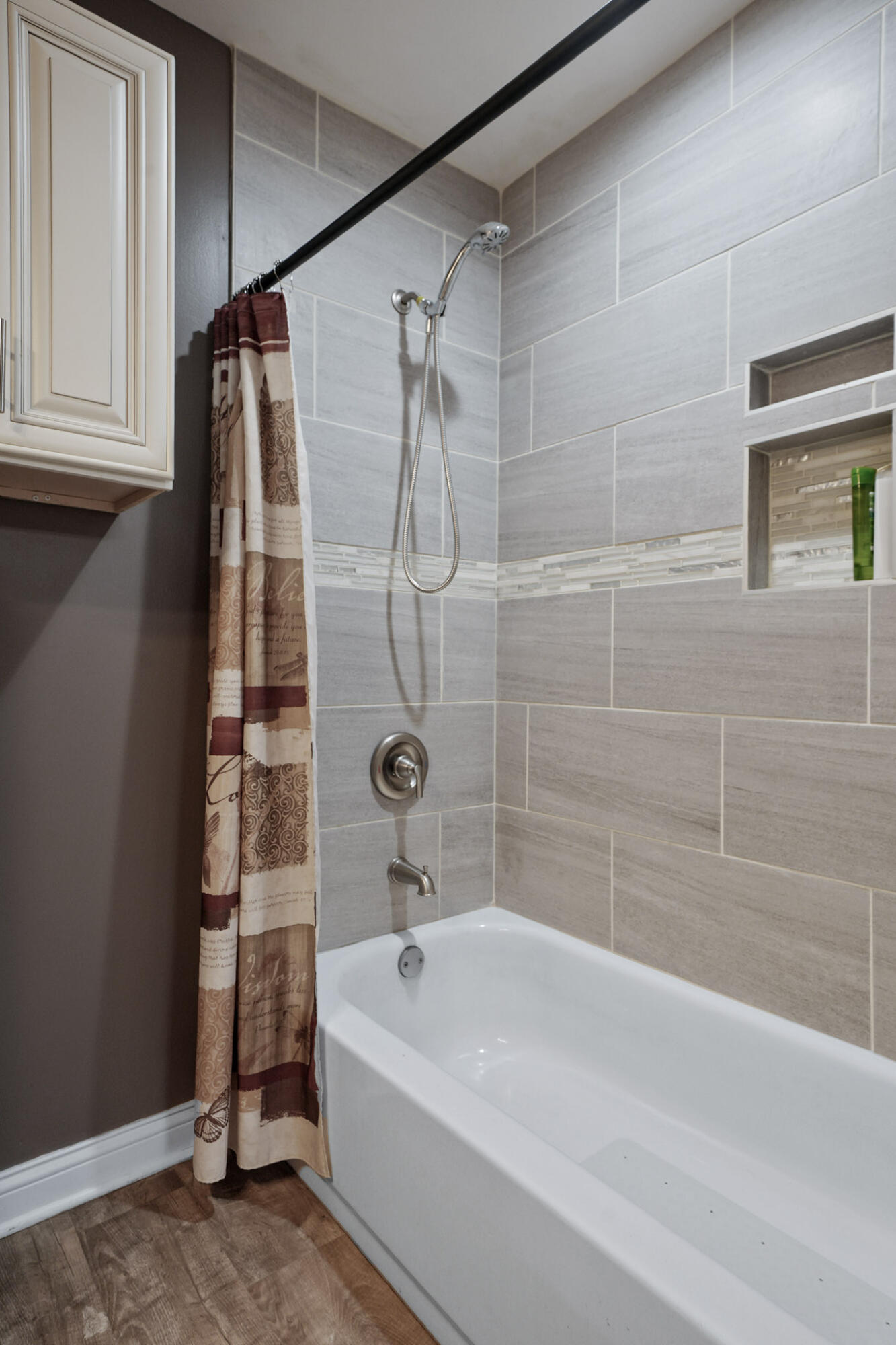 345 Castle Street Lowell, IN 46356 - Photo 24 of 27 a bathroom with a bathtub and a shower