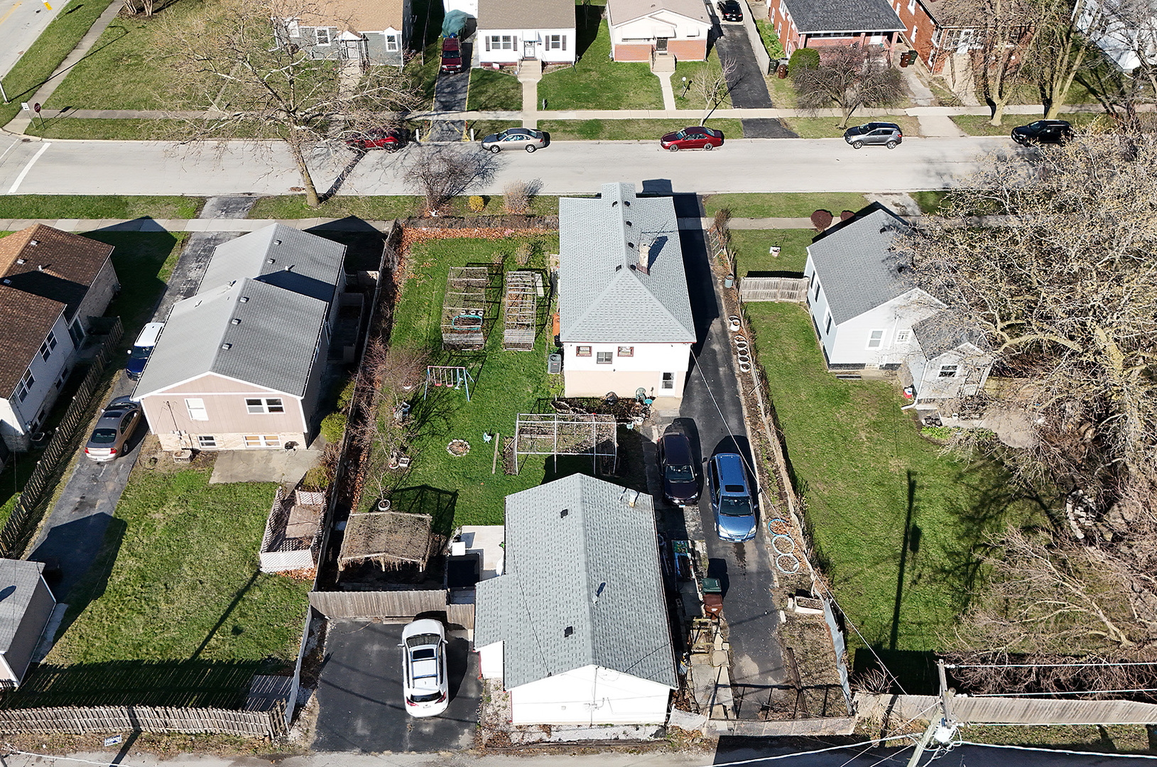 17073 Shea Avenue Hazel Crest, IL 60429 - Photo 24 of 27 an aerial view of a house with a garden and trees