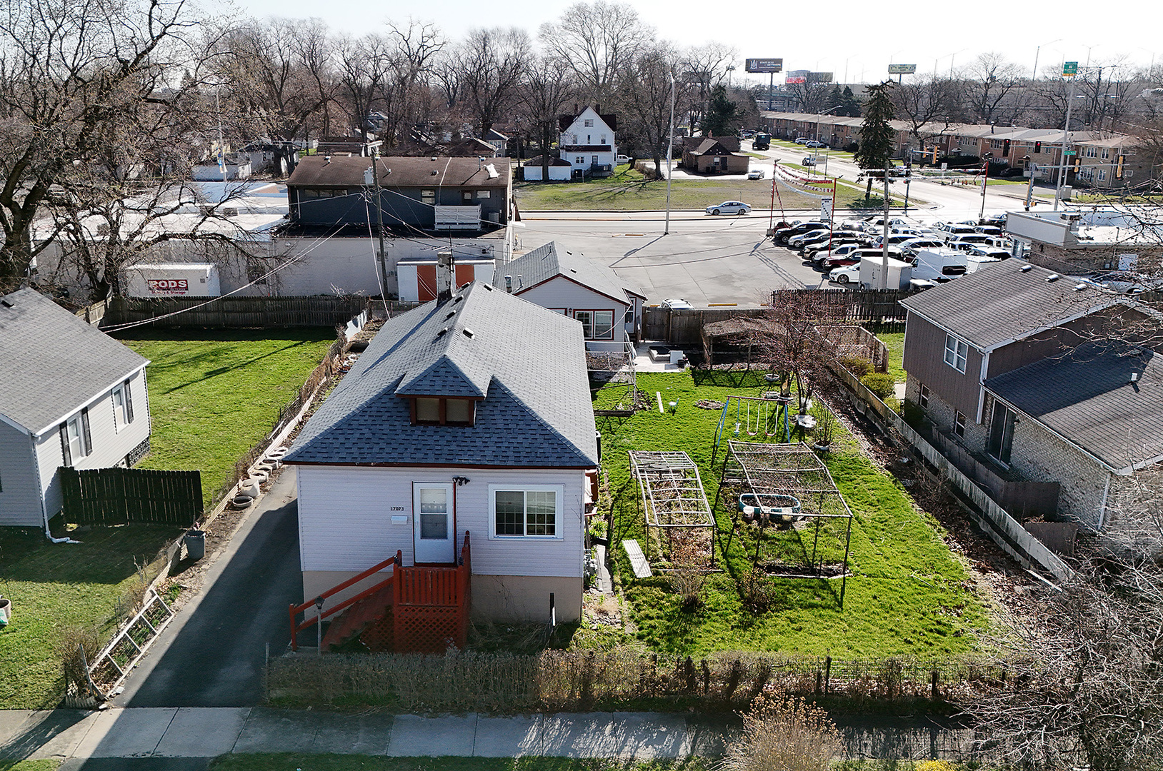 17073 Shea Avenue Hazel Crest, IL 60429 - Photo 25 of 27 an aerial view of a house with a garden and lake view
