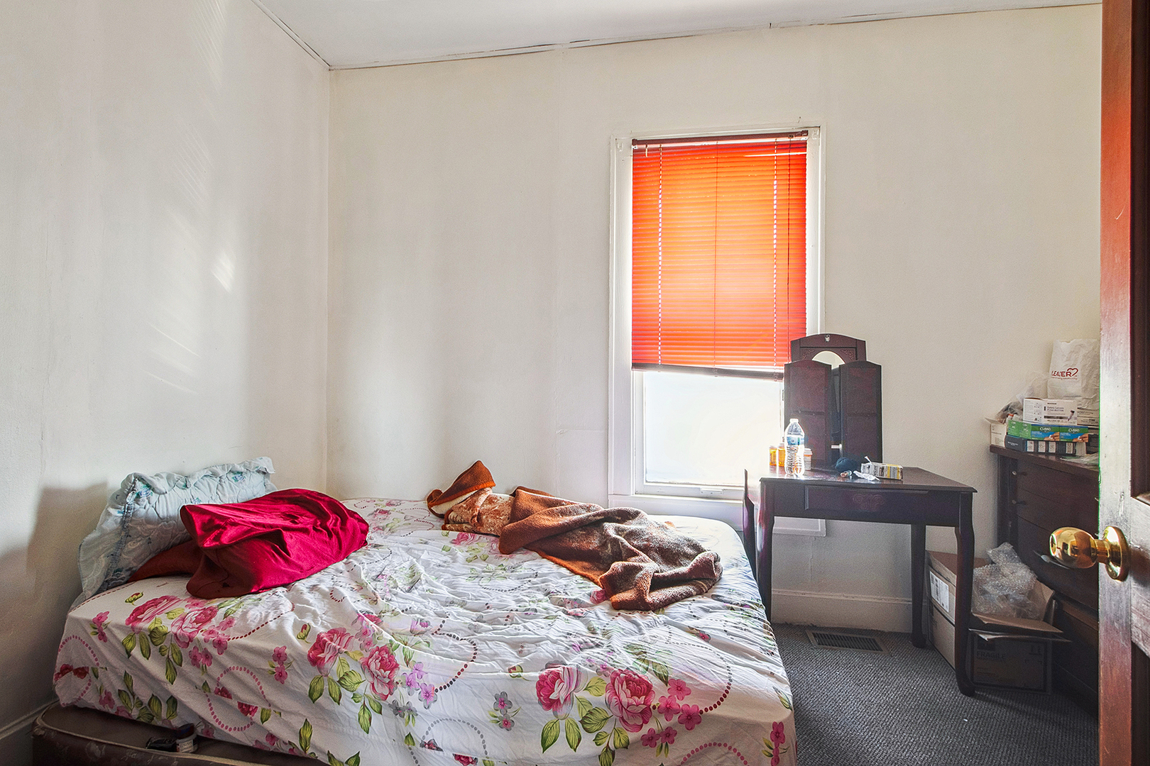17073 Shea Avenue Hazel Crest, IL 60429 - Photo 8 of 27 a bedroom with a bed and a window
