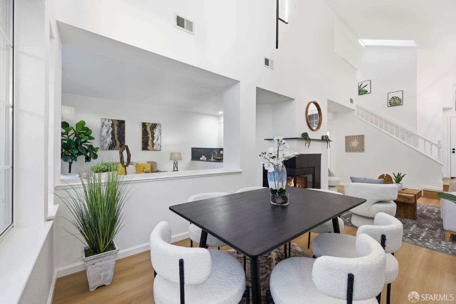 287 Scotts Valley Hercules, CA 94547 - Photo 17 of 42 a view of a dining room with furniture and wooden floor