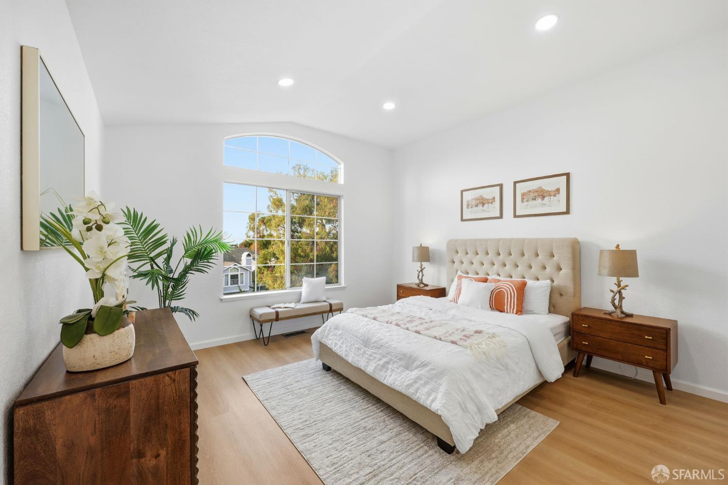 287 Scotts Valley Hercules, CA 94547 - Photo 19 of 42 a bedroom with a bed and a potted plant