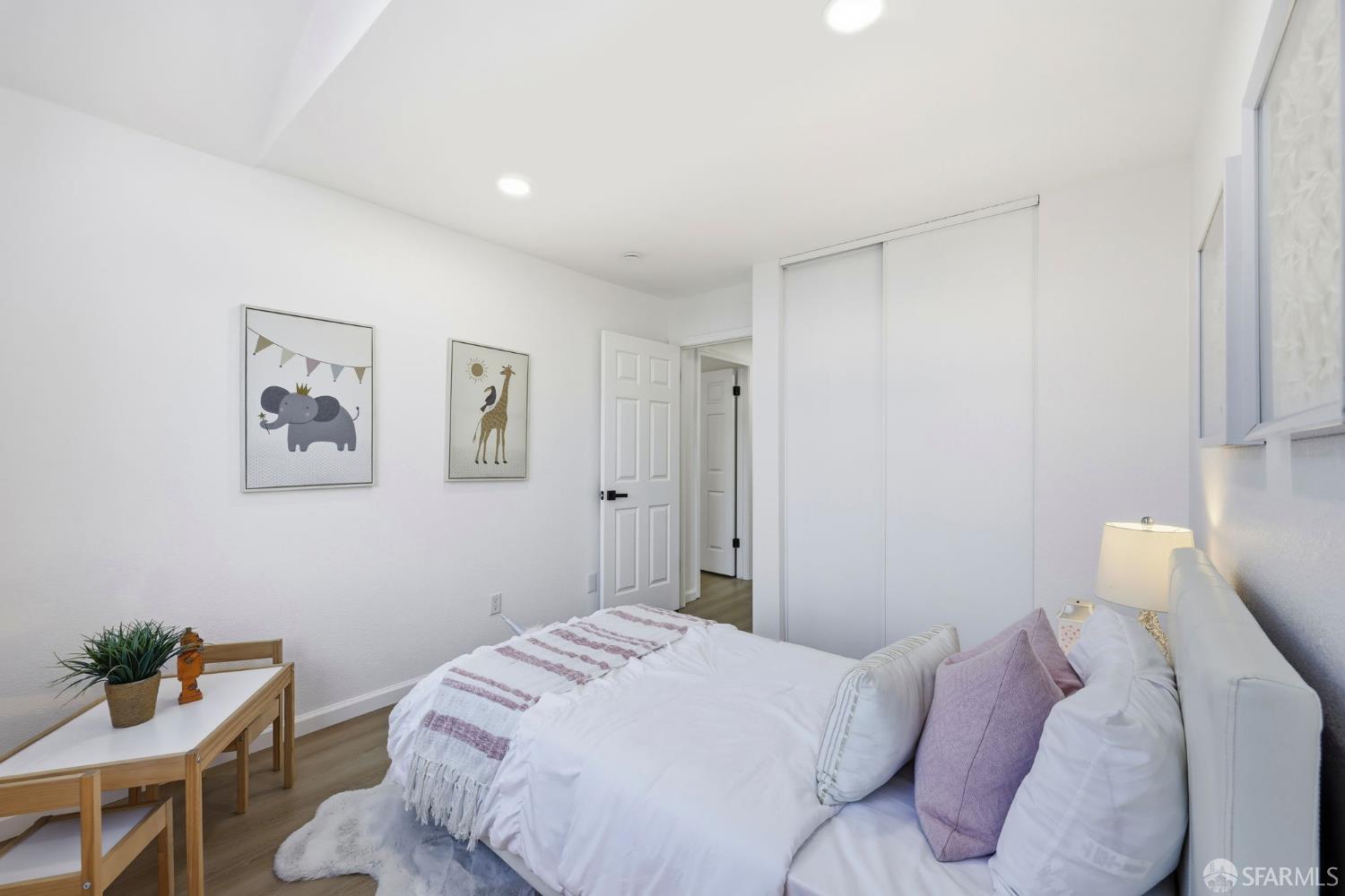 287 Scotts Valley Hercules, CA 94547 - Photo 24 of 42 a bedroom with a bed and furniture