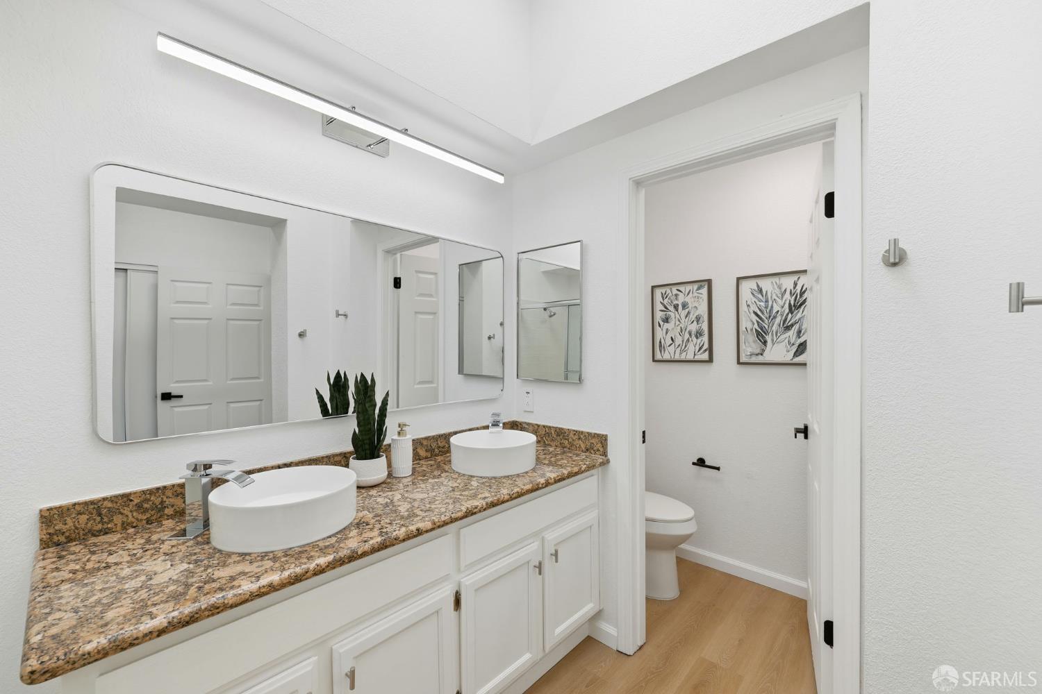 287 Scotts Valley Hercules, CA 94547 - Photo 30 of 42 a bathroom with sink granite and a mirror