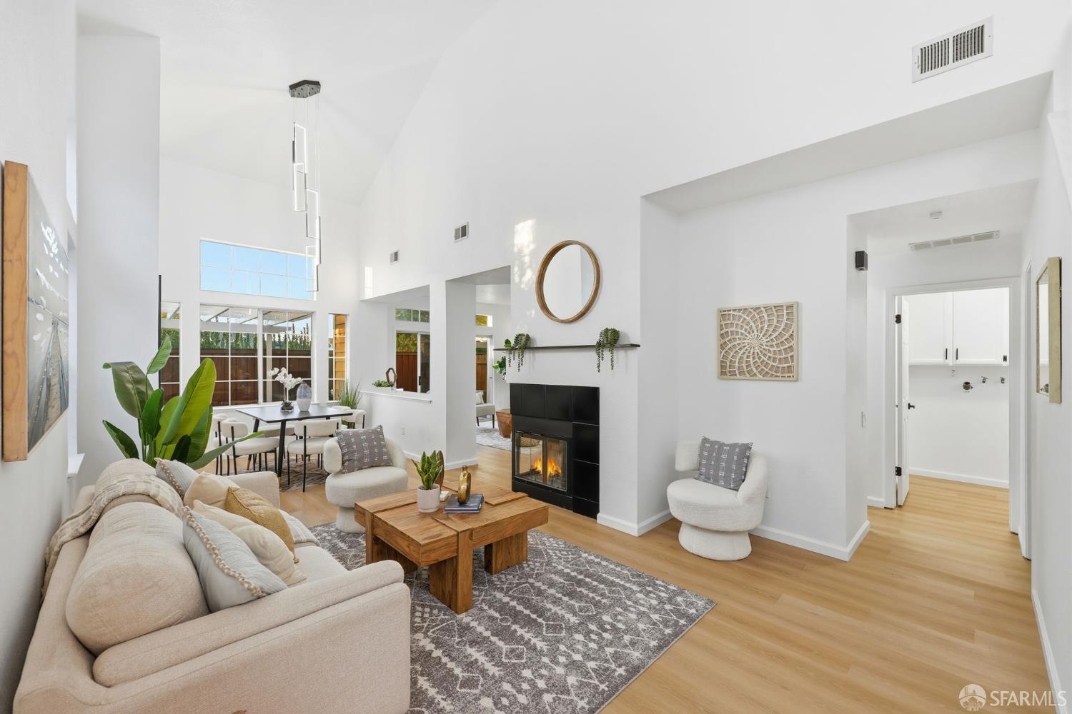 287 Scotts Valley Hercules, CA 94547 - Photo 3 of 42 a living room with furniture and a fireplace