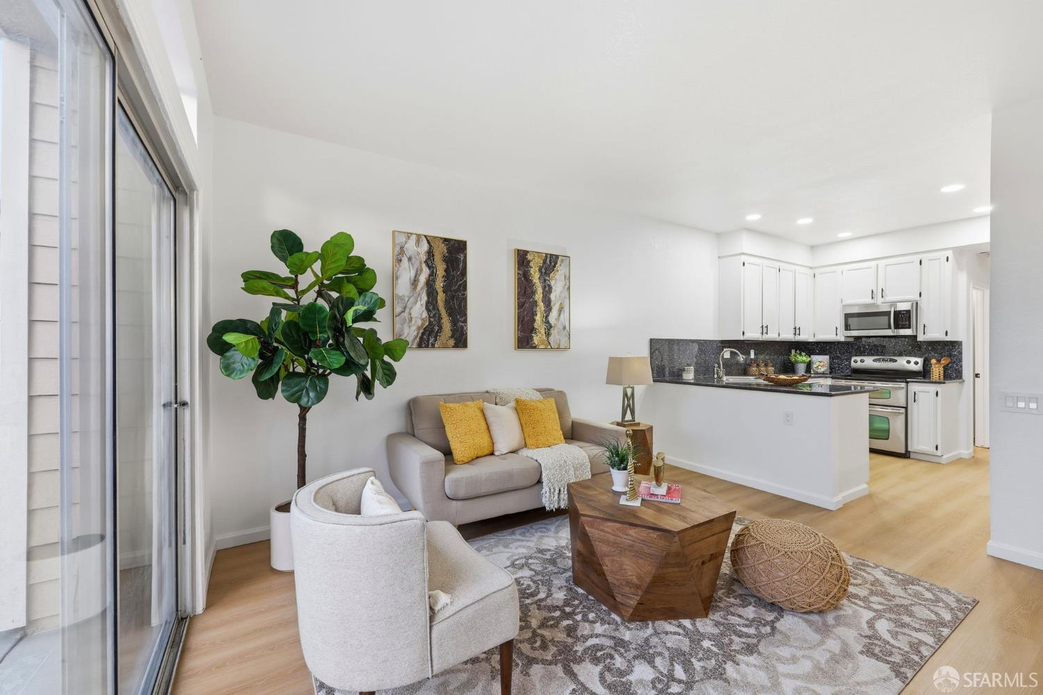 287 Scotts Valley Hercules, CA 94547 - Photo 10 of 42 a living room with furniture and a potted plant