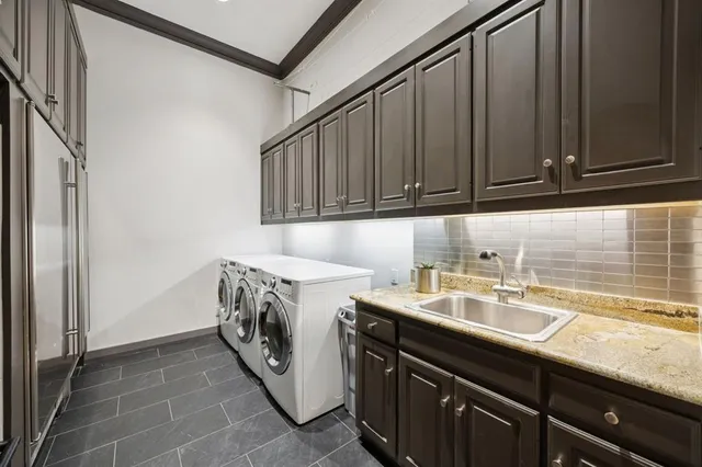 a view of a room with lots of wooden furniture