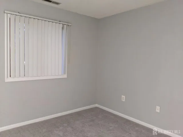 a view of a small space with a window