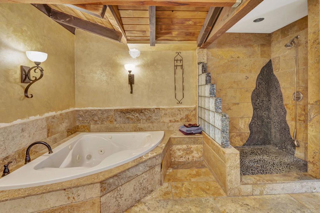 17620 Lyons Valley Road Jamul, CA 91935 - Photo 17 of 32 a bathroom with a sink and a shower