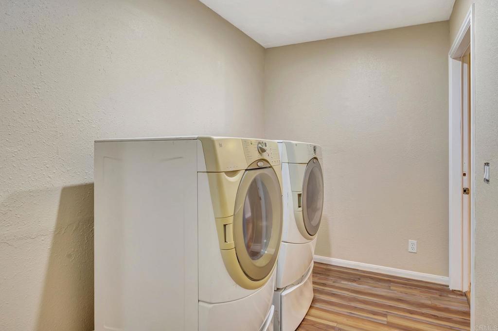 17620 Lyons Valley Road Jamul, CA 91935 - Photo 21 of 32 a utility room with dryer and washer