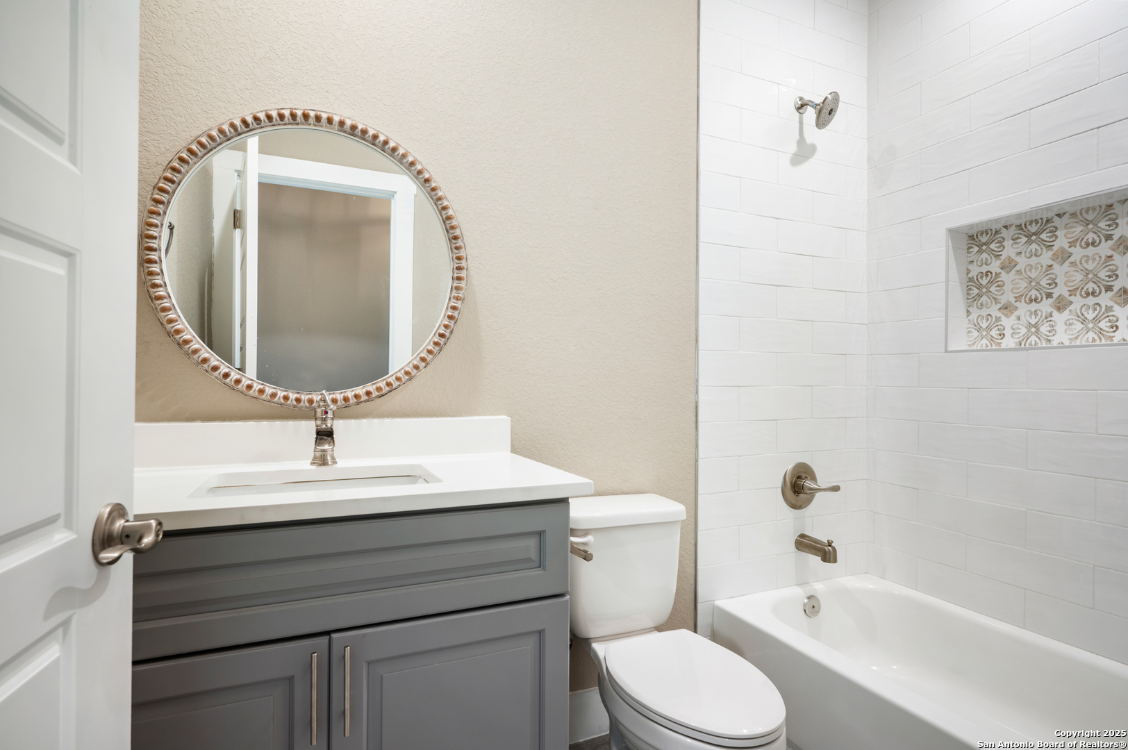 1066 Primrose Path Spring Branch, TX 78070 - Photo 15 of 24 a bathroom with a toilet sink and mirror