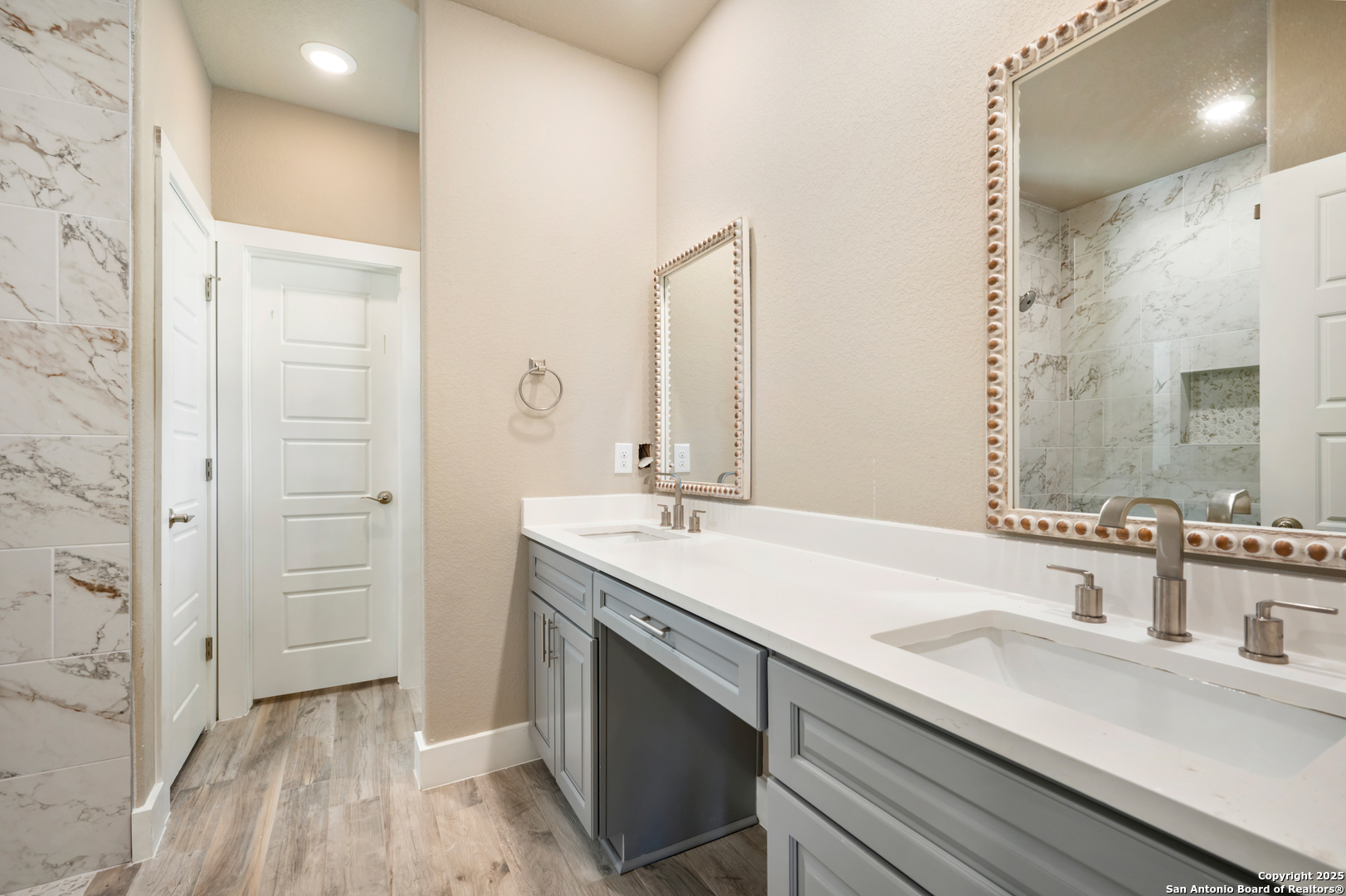 1066 Primrose Path Spring Branch, TX 78070 - Photo 10 of 24 a bathroom with a sink and a mirror