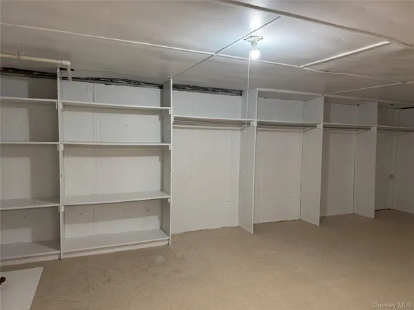 a view of an empty room with empty racks