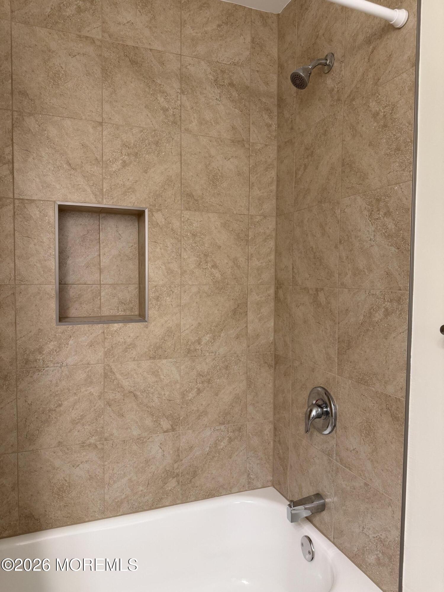 5 Canary Circle Howell, NJ 07731 - Photo 23 of 32 a bathroom with a shower
