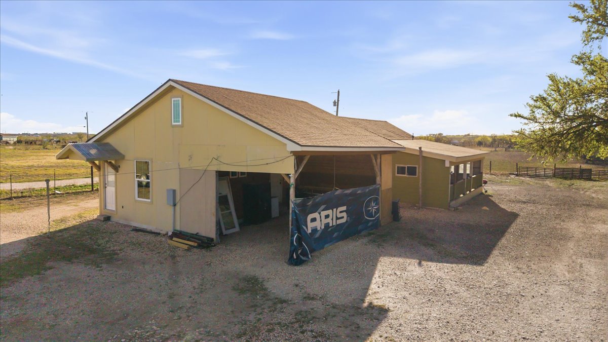 17309 Skog Road Elgin, TX 78621 - Photo 14 of 17 a view of a house with a outdoor space