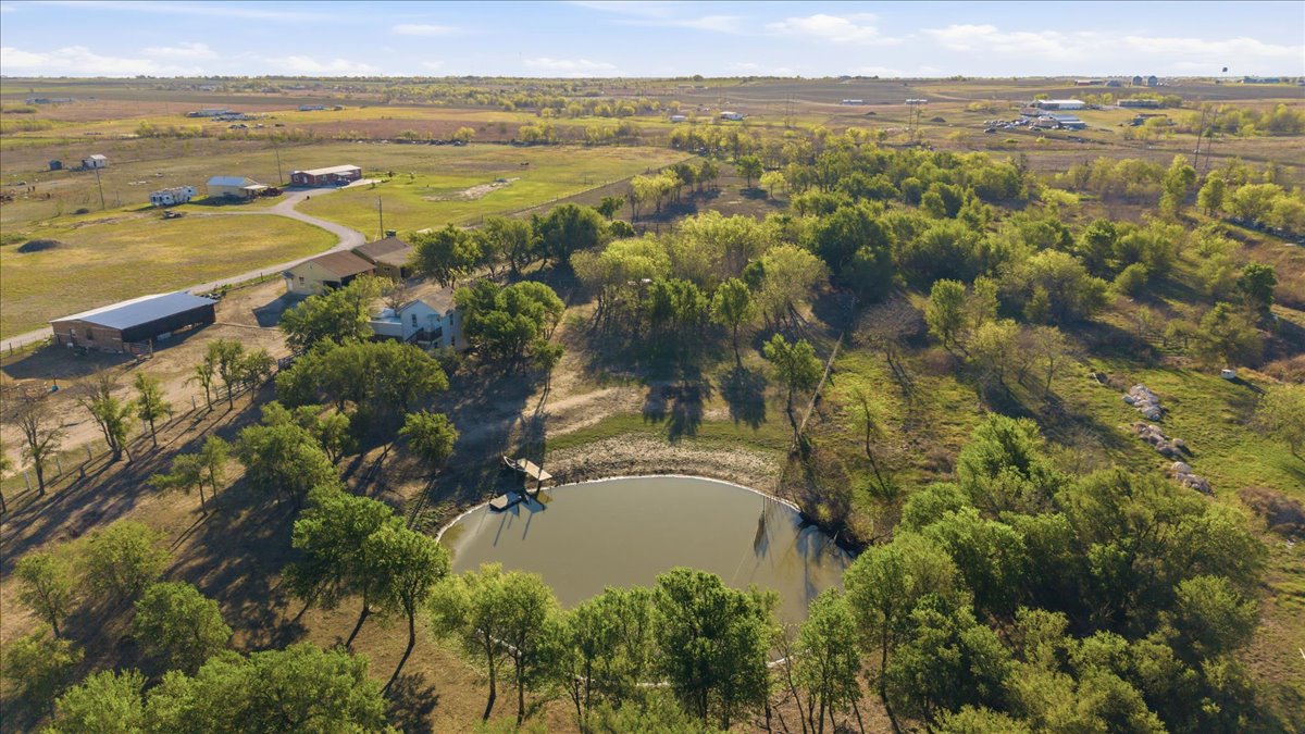 17309 Skog Road Elgin, TX 78621 - Photo 4 of 17 a view of a lake with a city