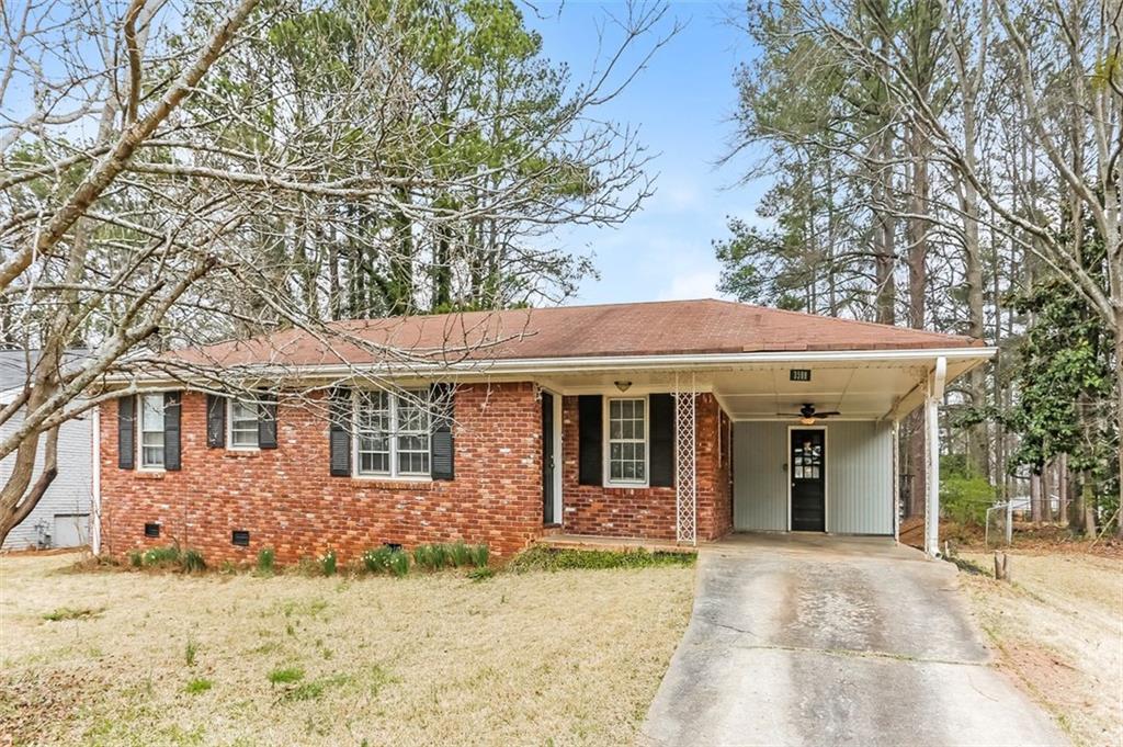 3588 Swallow Lane Decatur, GA 30032 - Photo 1 of 1 front view of a house with a yard