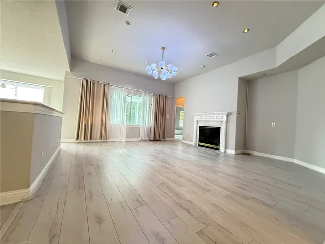 a view of livingroom with kitchen