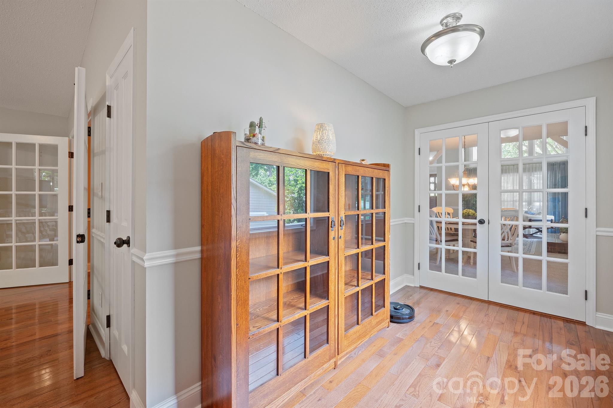 19017 Kailua Circle Tega Cay, SC 29708 - Photo 19 of 46 a view of an entryway with wooden floor and windows