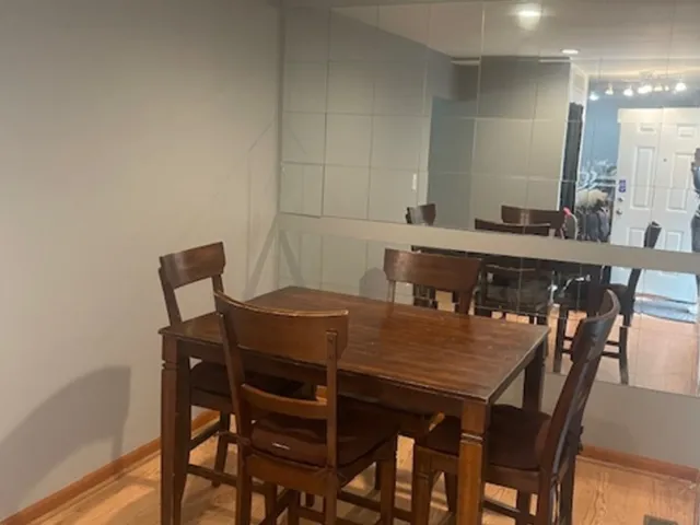 a view of a dining room with furniture