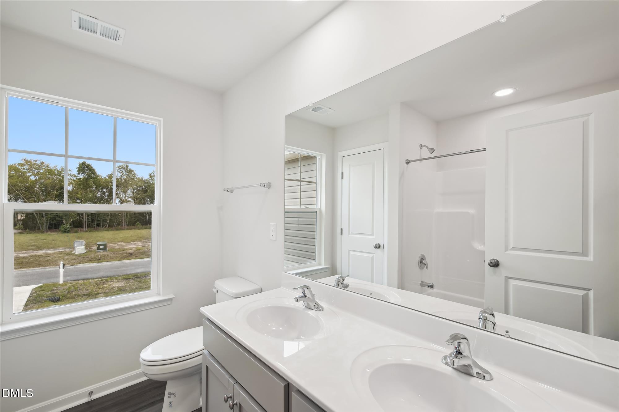 1409 Porchlight Court Raleigh, NC 27603 - Photo 14 of 19 Summit -upper level-bath