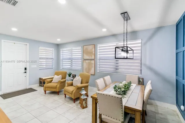 a view of a livingroom with furniture and window