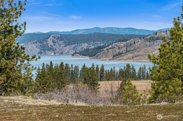 a view of a lake with mountains in the background