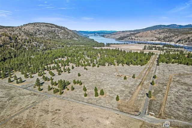 a view of a mountain with a mountain in the background