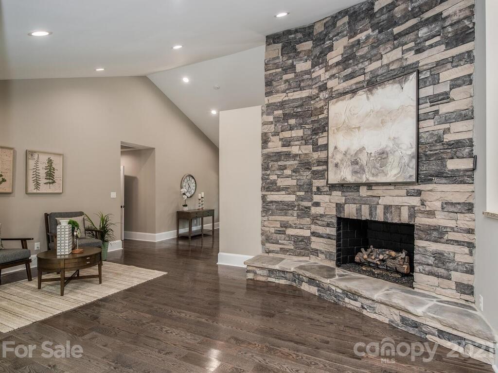 5923 Sharon View Road Charlotte, NC 28226 - Photo 17 of 44 a living room with furniture and a fireplace