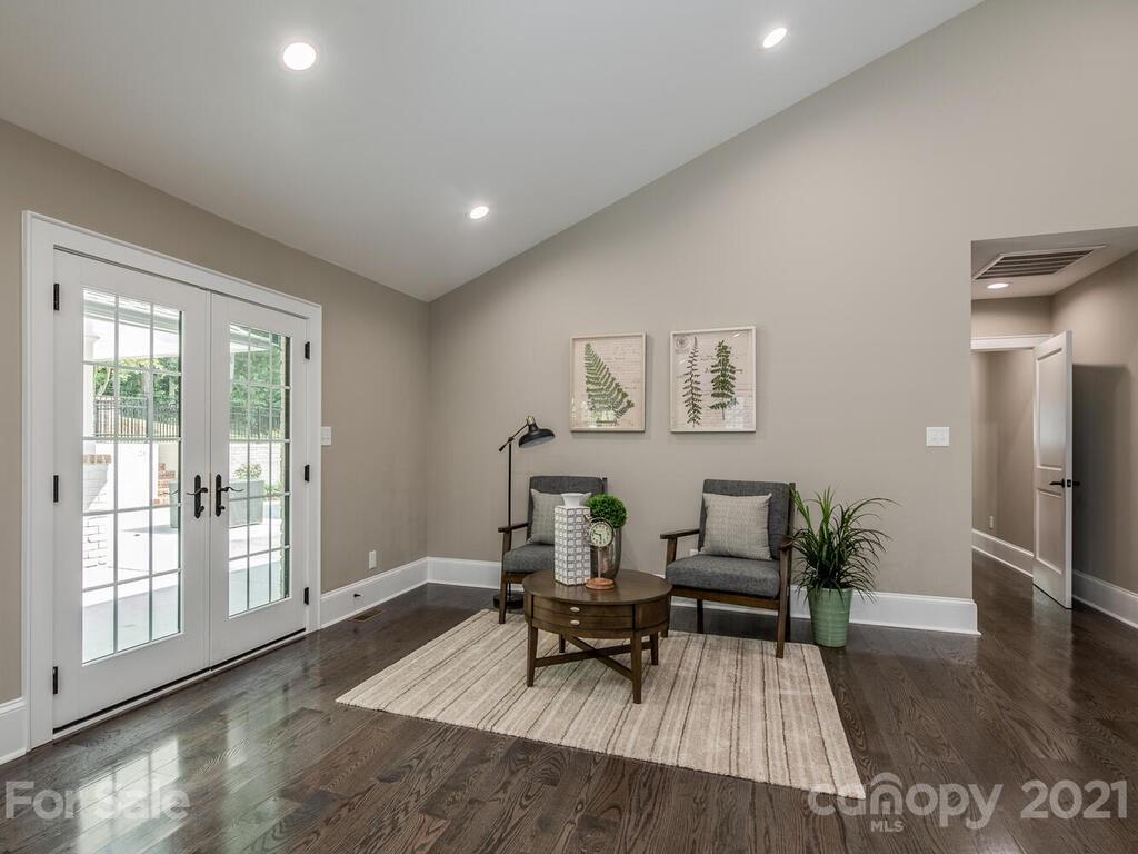 5923 Sharon View Road Charlotte, NC 28226 - Photo 18 of 44 a living room with furniture and a wooden floor