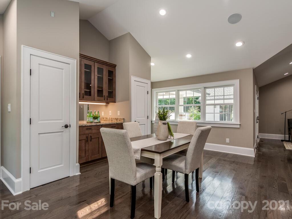 5923 Sharon View Road Charlotte, NC 28226 - Photo 24 of 44 a view of a dining room with furniture window and wooden floor
