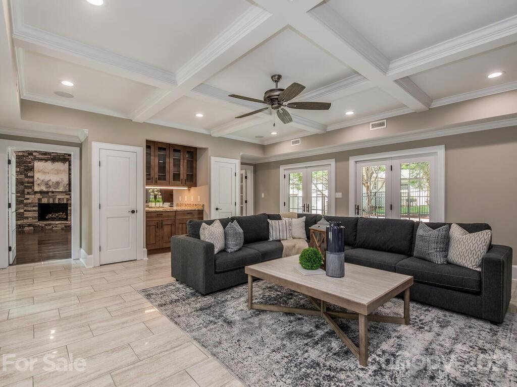 5923 Sharon View Road Charlotte, NC 28226 - Photo 26 of 44 a living room with furniture a view of bedroom and a window