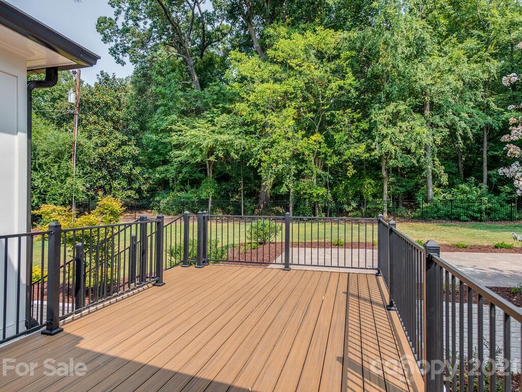 5923 Sharon View Road Charlotte, NC 28226 - Photo 33 of 44 a view of a wooden deck with a large trees