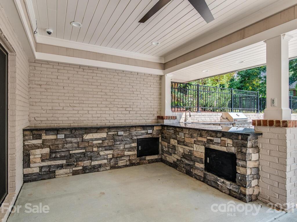 5923 Sharon View Road Charlotte, NC 28226 - Photo 34 of 44 a room with fireplace and window