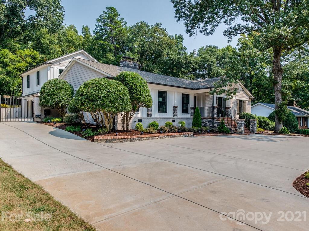5923 Sharon View Road Charlotte, NC 28226 - Photo 42 of 44 front view of house with a street