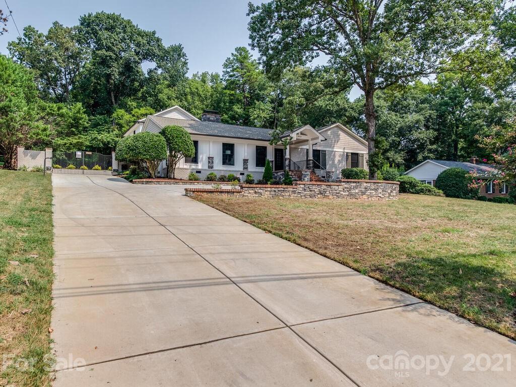 5923 Sharon View Road Charlotte, NC 28226 - Photo 44 of 44 a front view of a house with yard
