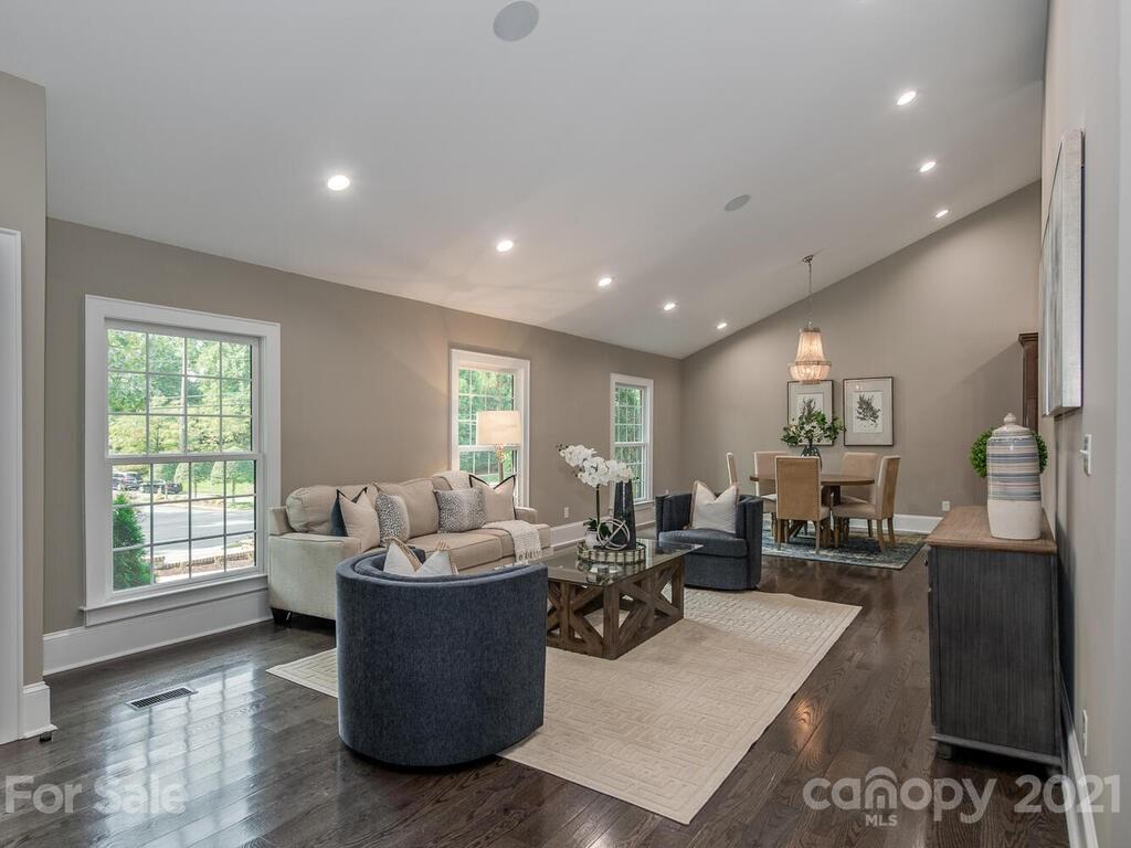 5923 Sharon View Road Charlotte, NC 28226 - Photo 5 of 44 a living room with furniture and a large window