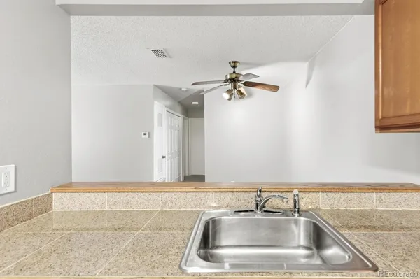 a bathroom with a sink and mirror