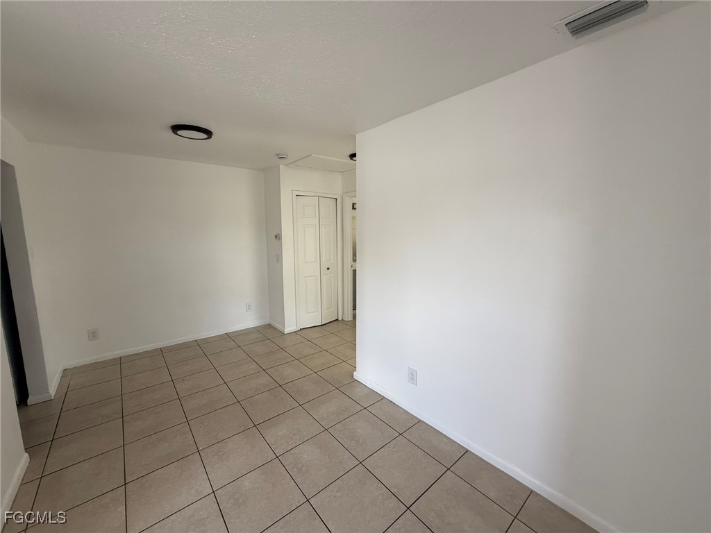 11431 Char Ann Drive, Unit 5 Fort Myers, FL 33908 - Photo 11 of 14 a view of an empty room