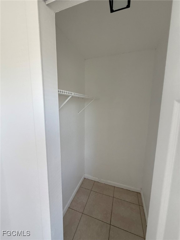 11431 Char Ann Drive, Unit 5 Fort Myers, FL 33908 - Photo 2 of 14 a view of an empty walk in closet