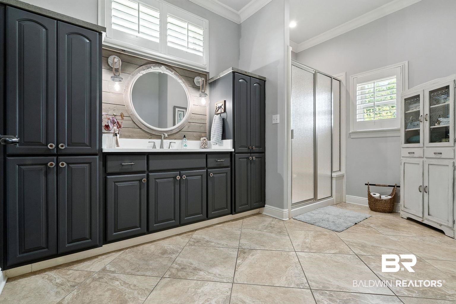 23357 Carnoustie Drive Foley, AL 36535 - Photo 55 of 99 Full bath featuring a stall shower, vanity, ornamental molding, and tile patterned flooring
