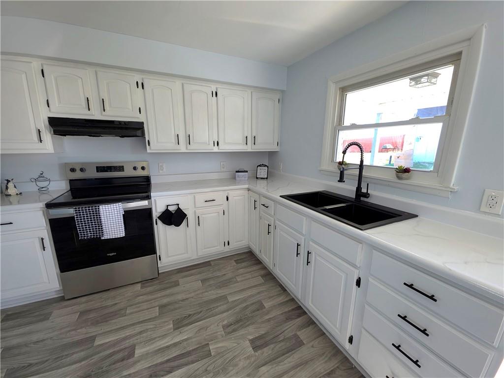84 Crossridge Road Charleroi, PA 15022 - Photo 15 of 35 a kitchen with granite countertop white cabinets and a sink
