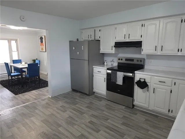 a living room with a couch and a table