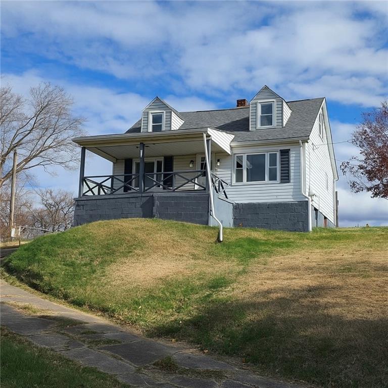84 Crossridge Road Charleroi, PA 15022 - Photo 2 of 35 a front view of a house with a yard